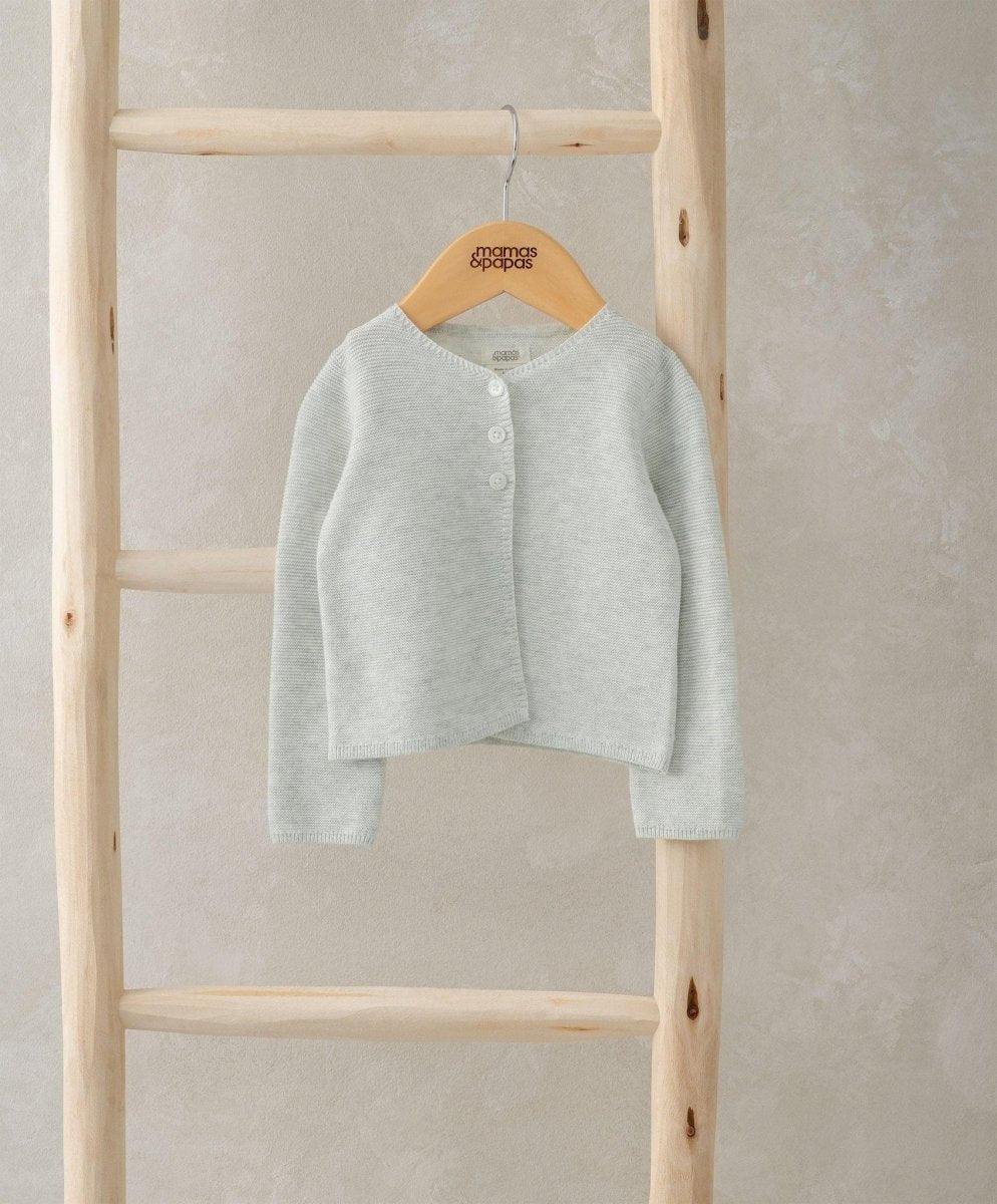 Grey knitted cardigan with button front, long sleeves, ribbed trim