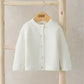 White knitted cardigan with button front and ribbed cuffs