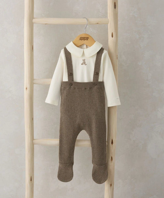 Cream long-sleeve bodysuit with teddy applique and brown knitted dungarees, front