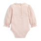 Light pink long-sleeve bodysuit with lace collar and buttoned front placket