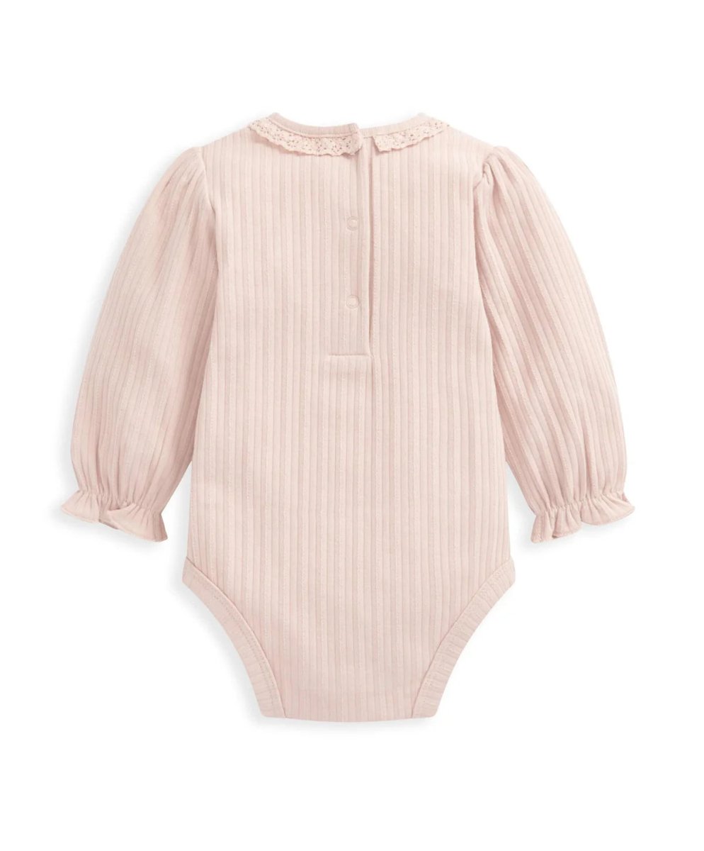 Light pink long-sleeve bodysuit with lace collar and buttoned front placket