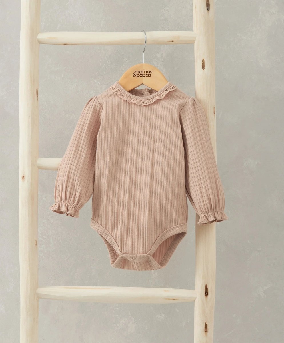 Pink lace-trim bodysuit with puff sleeves and ruffled collar