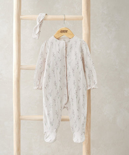 Cream floral footed baby onesie with long sleeves and matching headband