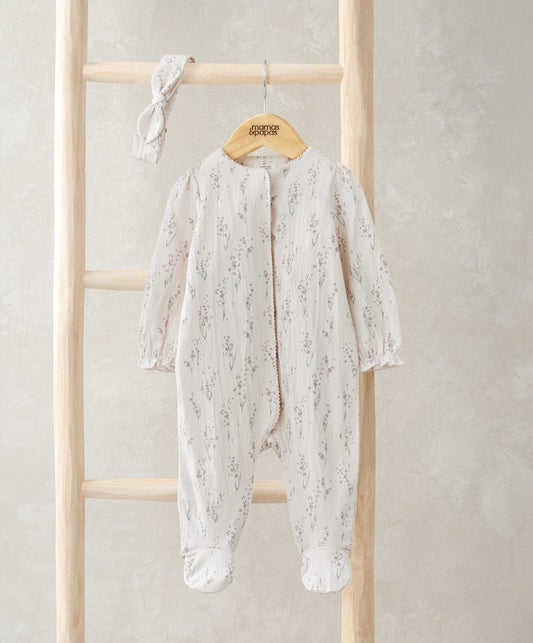 Cream floral footed baby onesie with long sleeves and matching headband