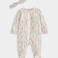 Cream floral long sleeve footed baby onesie with round neckline