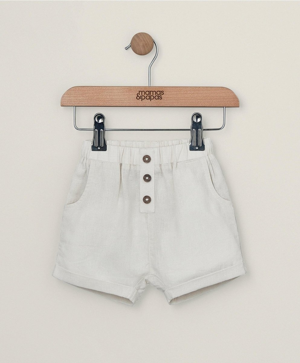 Light linen shorts with elastic waist, button front, and side pockets