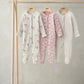 3-pack long sleeve sleepsuits: white with fruit print, pink floral, cream star print