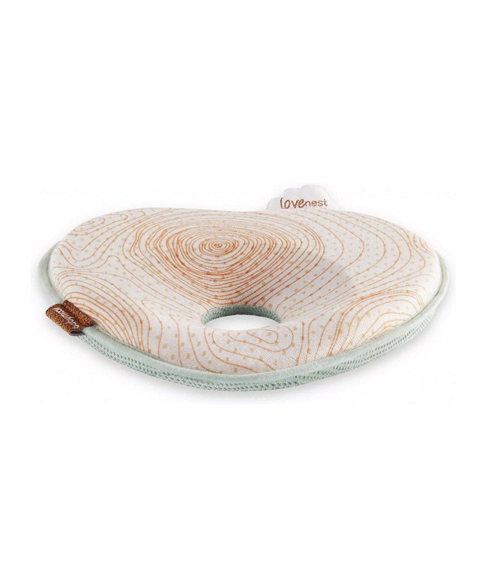 Natural Care headrest with swirl print, mint-edged border and side profile