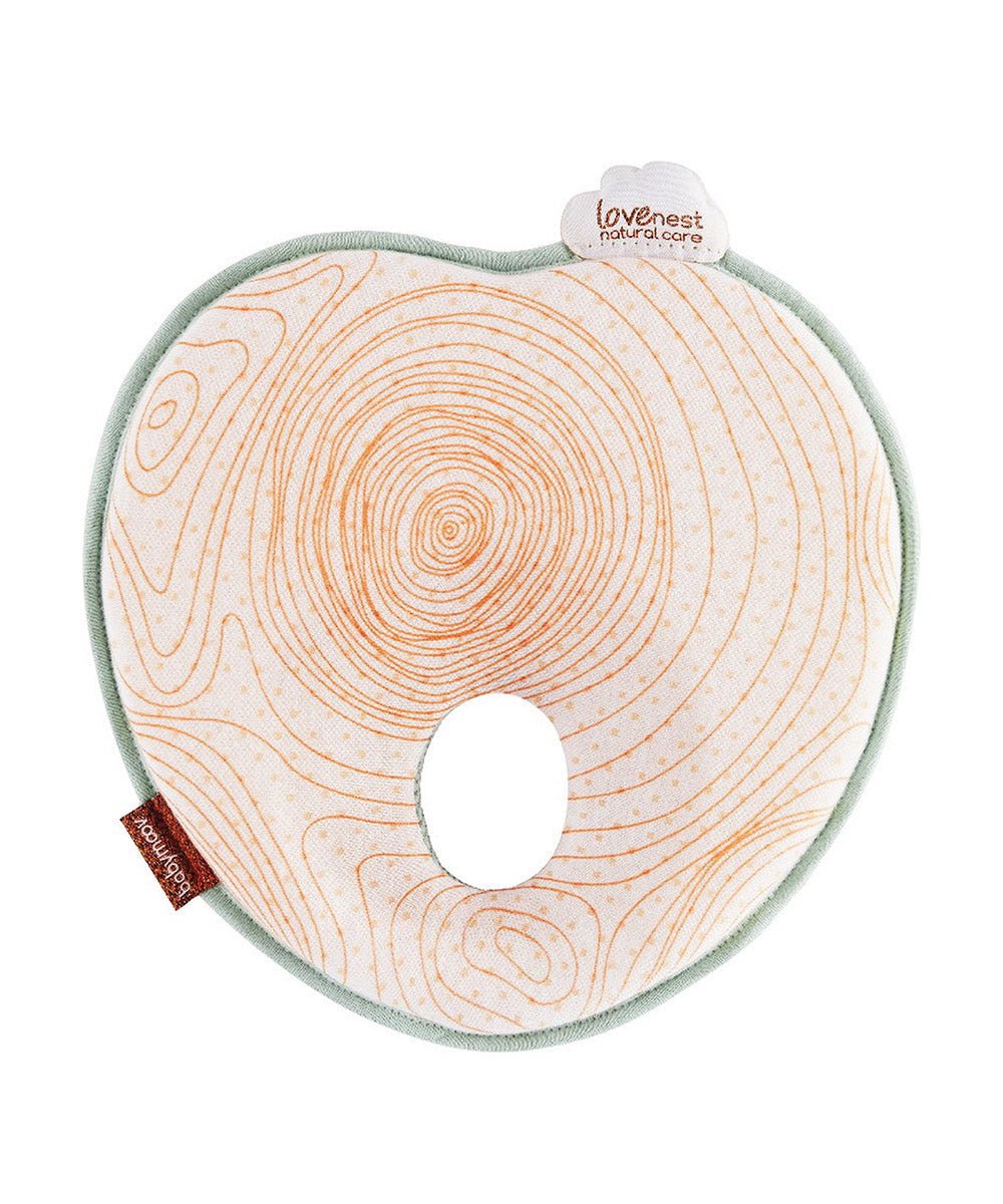 Natural Care headrest with swirl pattern and mint trim, circular neck cutout