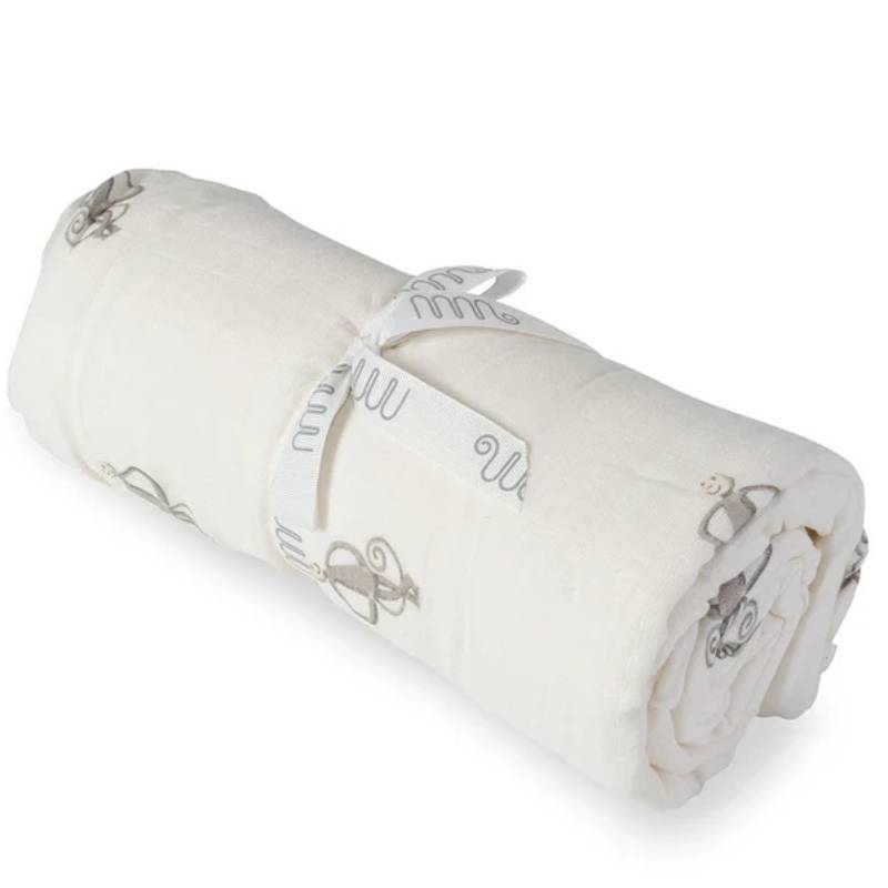 Bamboo blanket with gray monkey pattern, rolled with printed border