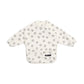 Long-sleeve baby bib, off-white with small fox-face circle print