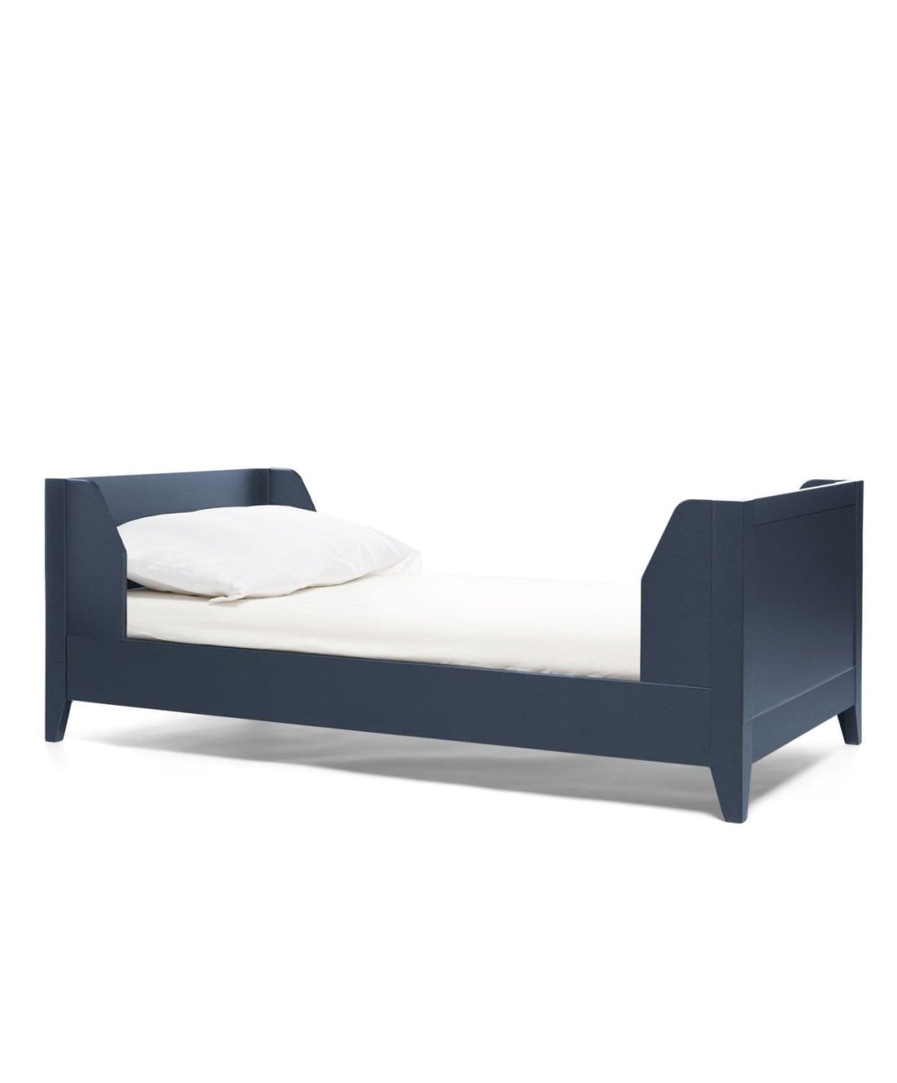 Midnight navy cotbed base with low side rails and slatted mattress supports
