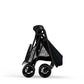 Folded stroller with canopy and compact four-wheel frame