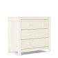 White Mia dresser changer with three front drawers and round knobs