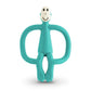 Teething toy monkey figure with teal ring handles and smiling face
