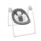Infant swing with gray cushioned seat, toy arch, and white frame