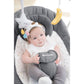 Baby in infant swing with gray seat and hanging moon, star, and bell toys