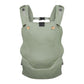 Sage green newborn baby carrier with buckled straps and front panel