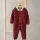 Burgundy long-sleeve Santa romper with white scalloped collar and snap buttons