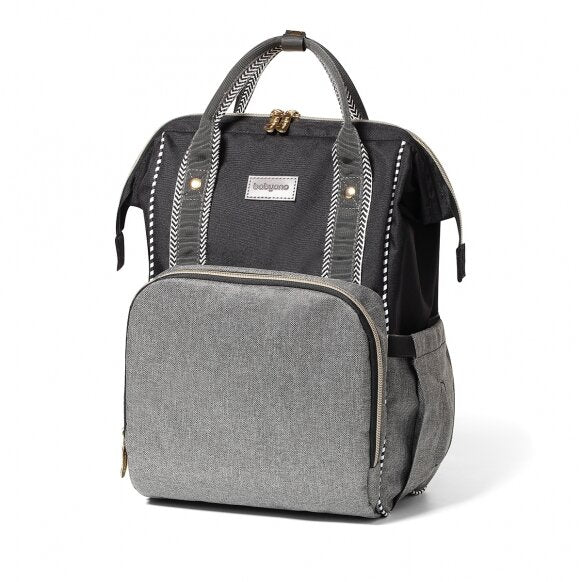 Black and gray mummy backpack with front pocket, zigzag trim, and top handle