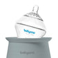 Grey babyono bottle warmer with clear bottle cap and visible control panel