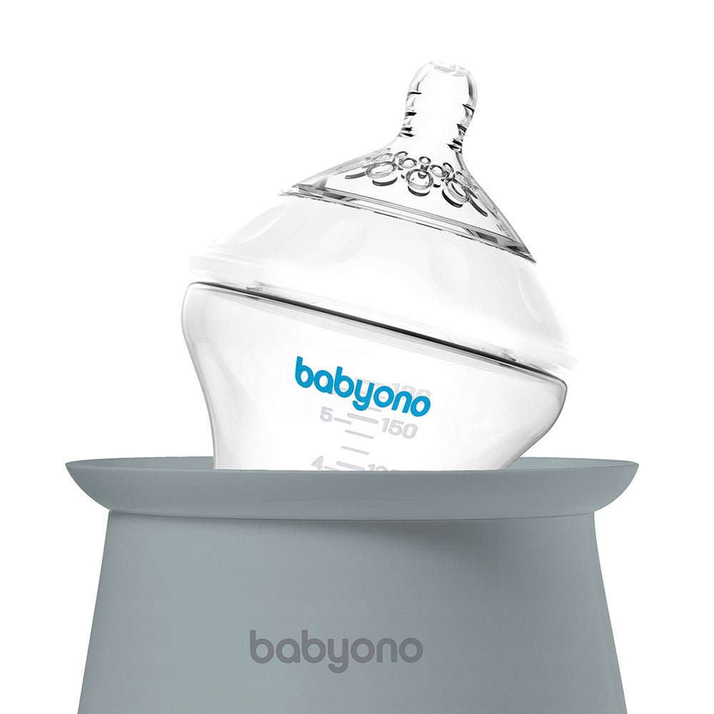 Grey babyono bottle warmer with clear bottle cap and visible control panel