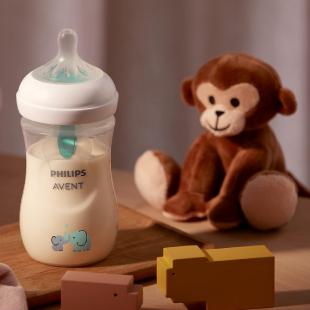 Philips Avent baby feeding bottle with elephant pattern and teal valve insert
