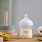 Philips Avent glass baby bottle with white newborn nipple, Natural Response