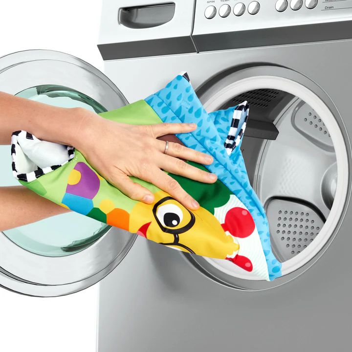 Machine-washable activity jumper fabric panel being removed