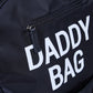 Nursery backpack with white 'DADDY BAG' logo on dark front pocket