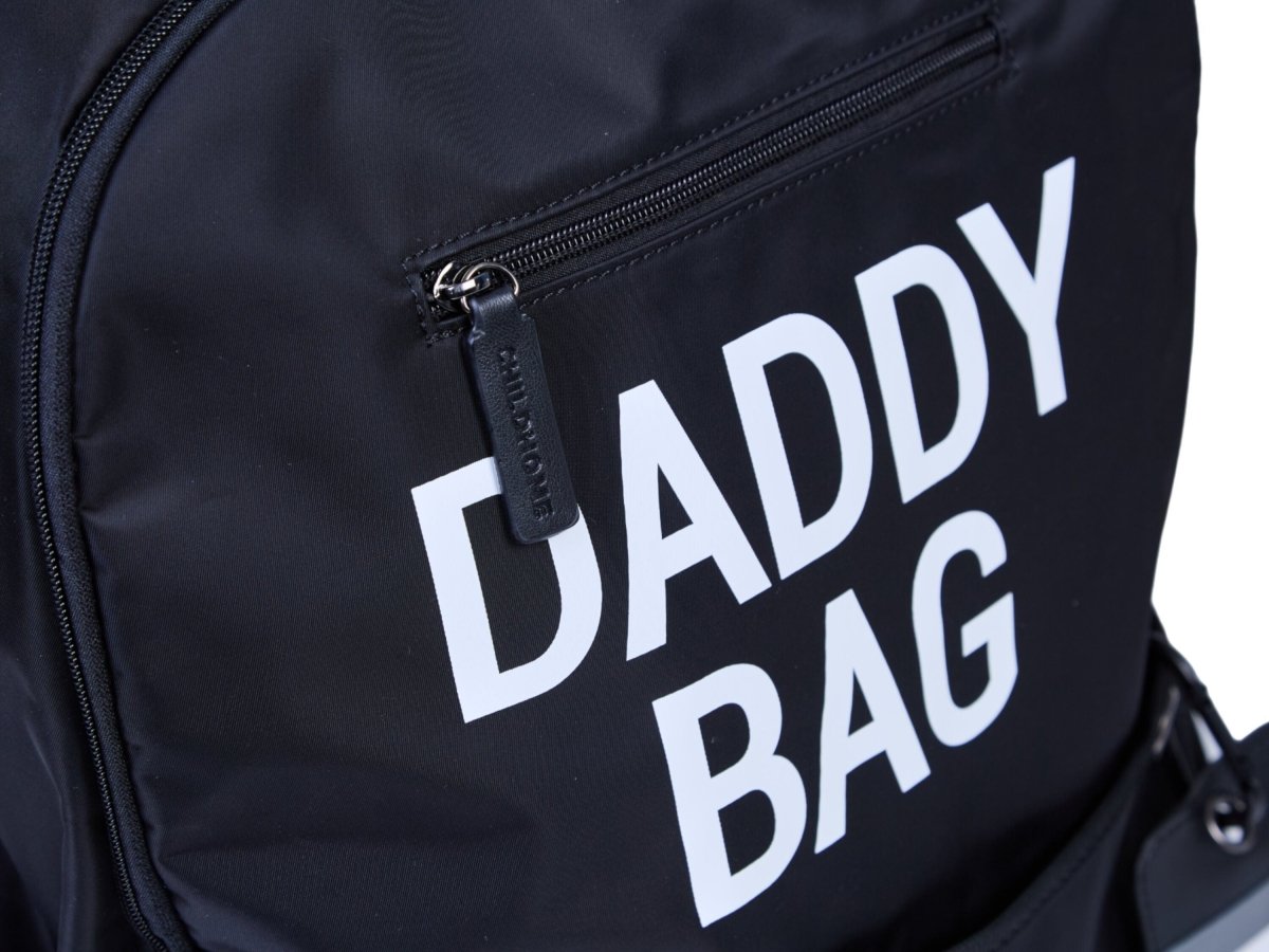 Nursery backpack with white 'DADDY BAG' logo on dark front pocket