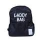 Nursery backpack with 'DADDY BAG' print, front zip pocket, and hanging ID tag