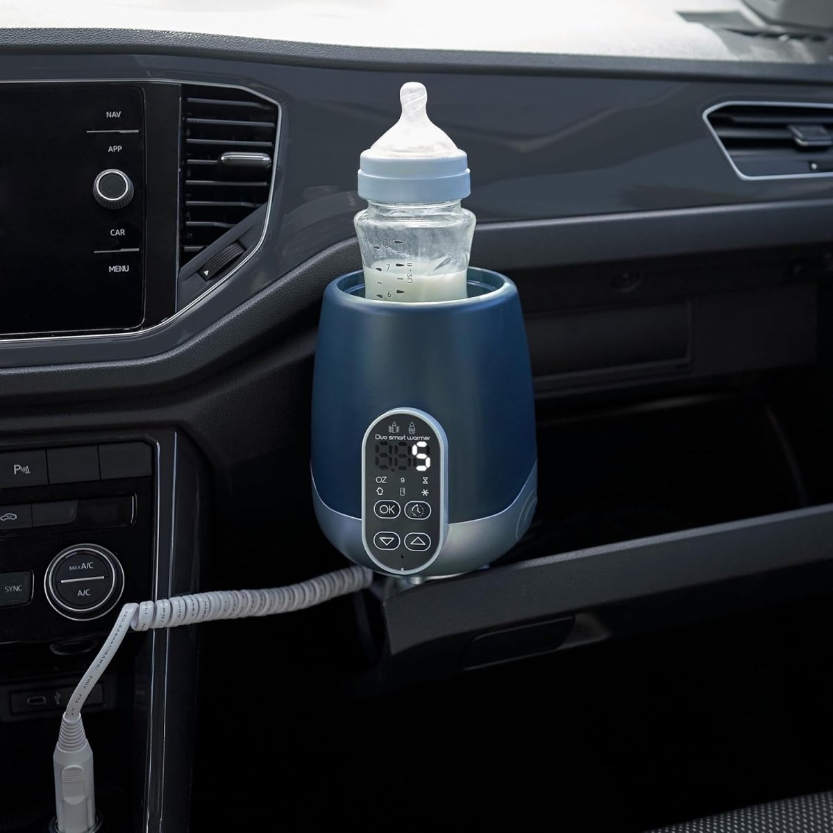 NutriSmart Nomad bottle warmer in car with power cable and milk bottle