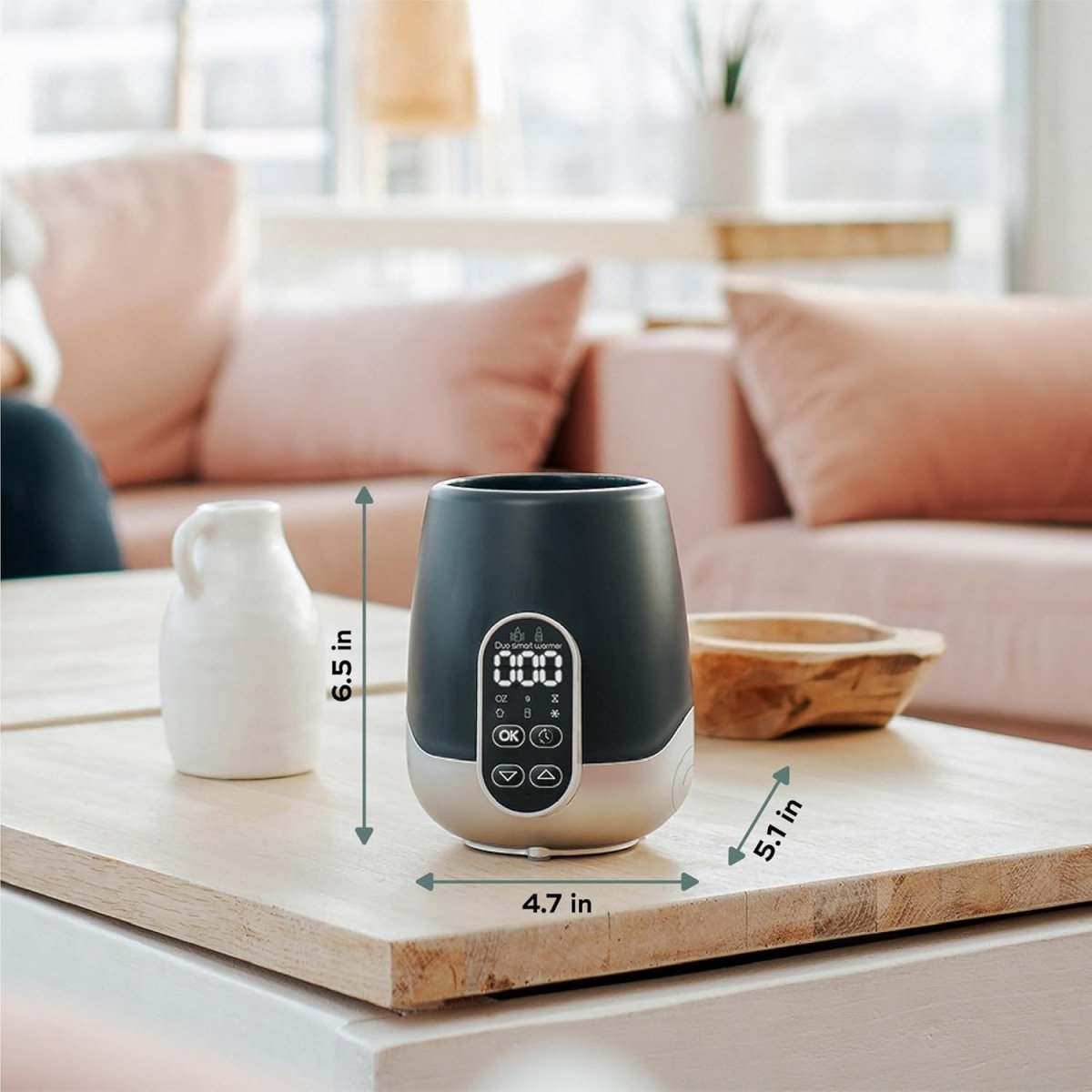 NutriSmart Nomad bottle warmer, dark navy body and white base with control panel