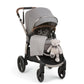 Heritage blanket on stroller seat, light gray textured knit with stitched pattern