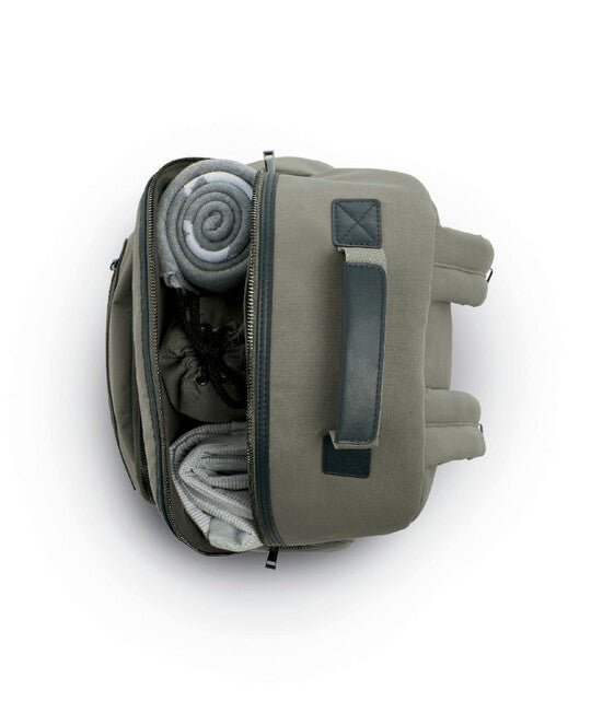 Olive green backpack opened to show rolled blanket and interior pockets
