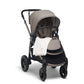 Travel blanket in off-white, draped on stroller seat