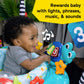 Baby interacting with a blue ocean activity jumper, pressing number and character toys