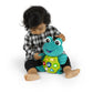 Teal frog plush with big eyes and colorful button panel