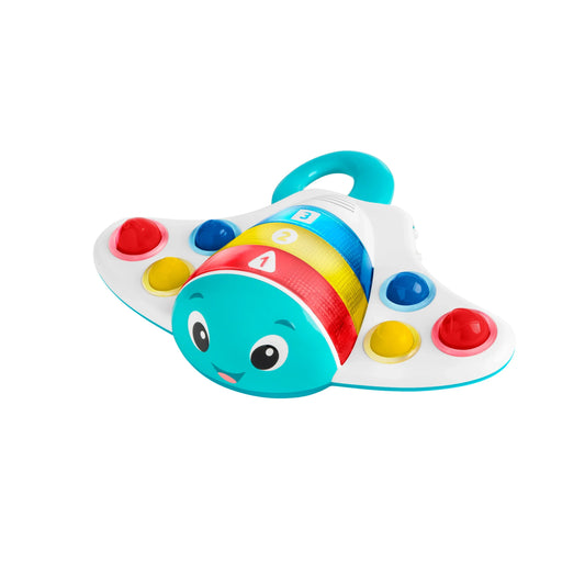 Blue and white stingray popper toy with colorful push buttons