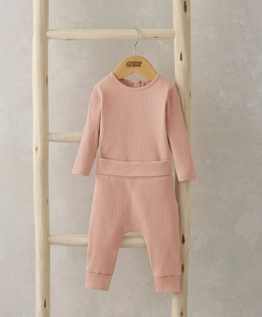 Pink ribbed long-sleeve bodysuit and matching bottom set with elastic cuffs