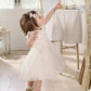 White organza flower dress with back bow and layered tulle skirt