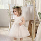 White organza flower dress with puff sleeves and full gathered skirt
