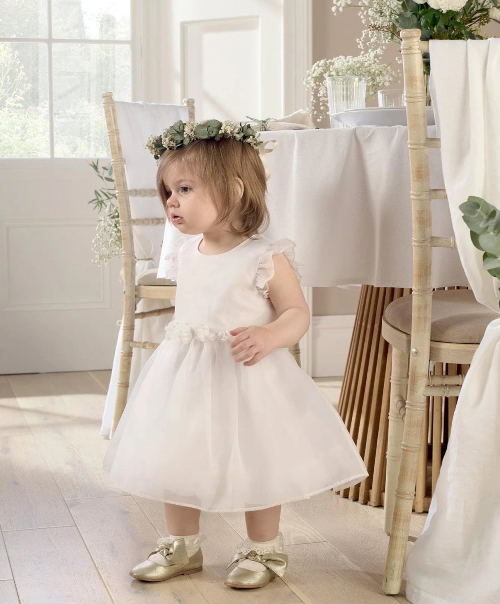 White organza flower dress with puff sleeves and full gathered skirt