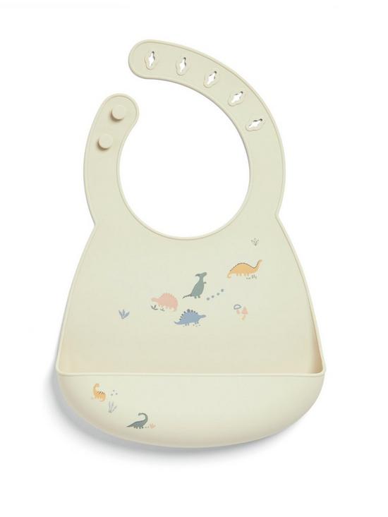 Silicone baby bib with pale green base and dinosaur scene print