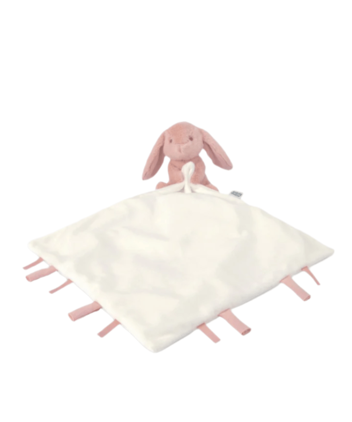 Pink bunny comforter with plush bunny head on corner and pink-trim tassel edges