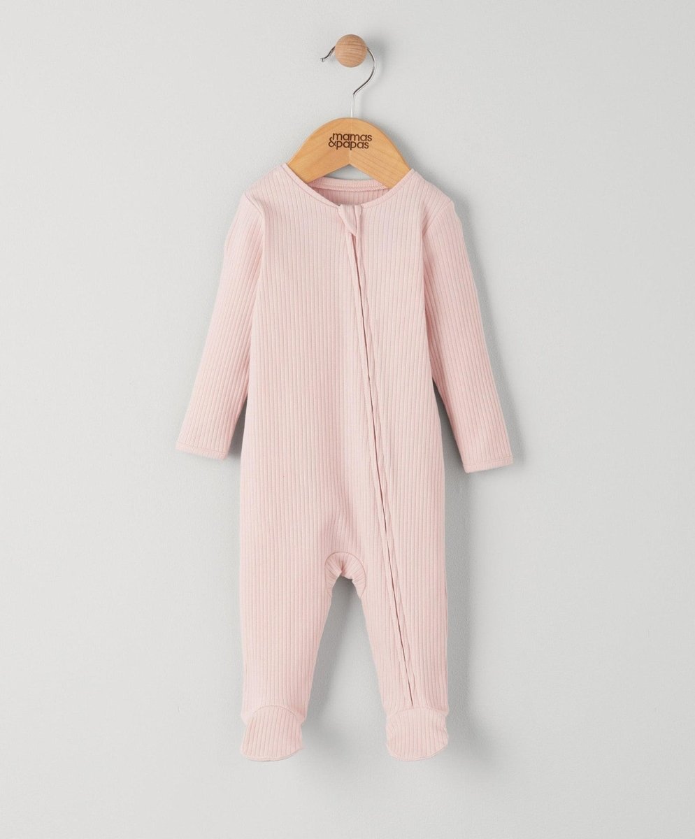 Pink ribbed zip sleepsuit with long sleeves and footed legs, front zipper