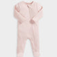 Pink ribbed zip sleepsuit front view with long sleeves and footed legs, zipper