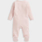 Pink ribbed sleepsuit back view with long sleeves and footed cuffs