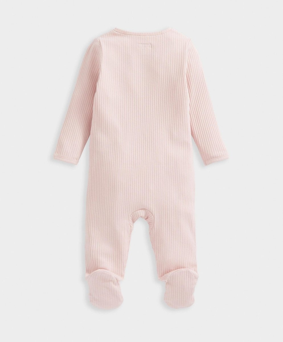 Pink ribbed sleepsuit back view with long sleeves and footed cuffs